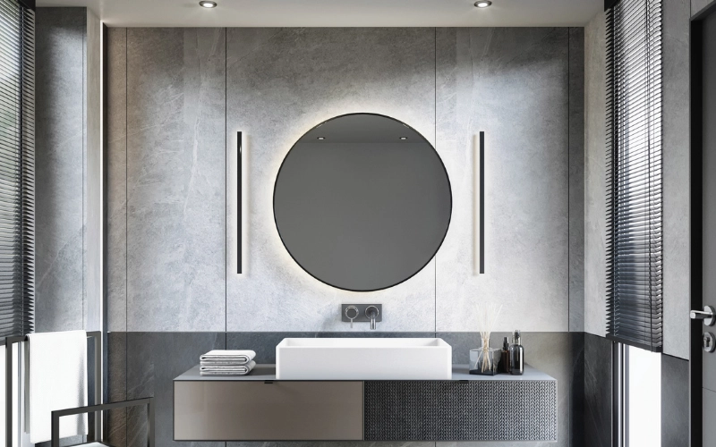 meuble de salle de bains design avec miroir rond et matériaux résistants